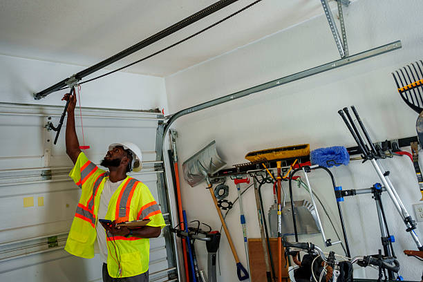Professional Garage Door Panel Replacement technician working in Lowell, MI